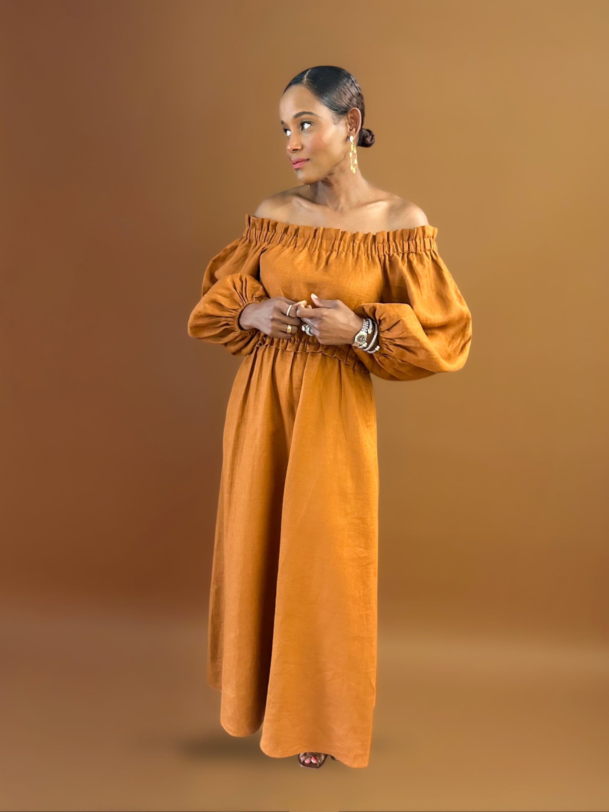 Solenna-romantic-off-the-shoulder-linen-maxi-dress-shown-in-Sienna-brown-rust-color